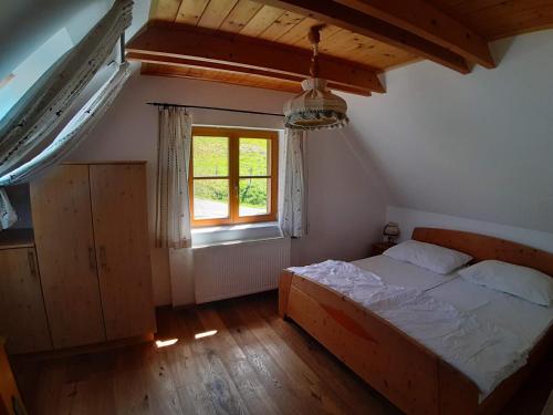 En eller flere senge i et værelse på Lachtalhütte