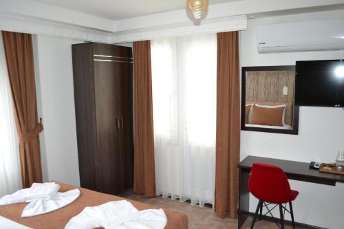 Cama o camas de una habitación en HOTEL GLOBAL 2022