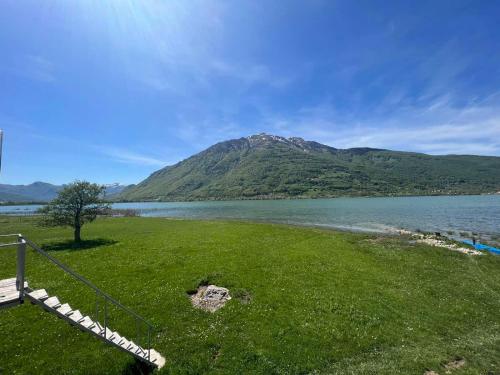 a view of a lake with a mountain in the background at Begov kamp, Plav in Plav