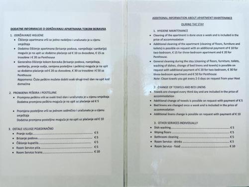 two white pages of a document with text at Fontana Residence Budva in Budva