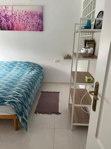 Кровать или кровати в номере Casa di Paddy