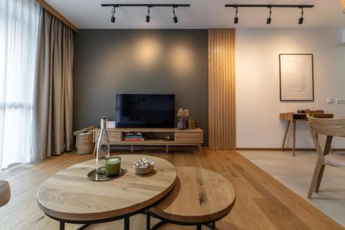 Televízia a/alebo spoločenská miestnosť v ubytovaní WILANESKA Apartament Olimpijska Szczyrk