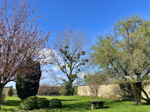 A garden outside Logis La Ferme Du Vert