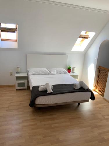 Postel nebo postele na pokoji v ubytování DUPLEX BAHIA SuR RESERVA DE CONFI-ANZA