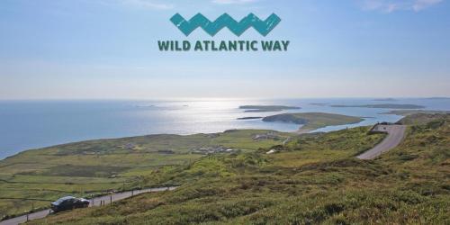 a view of a hill with the wild atlantic way at Clifden Bay Lodge in Clifden
