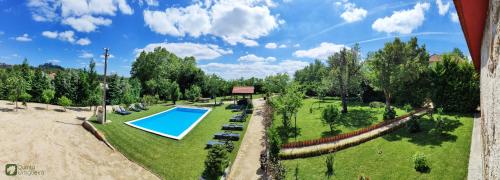an overhead view of a swimming pool in a park at Quinta da Urtigueira in Felgueiras