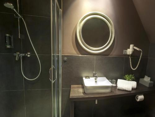 Un baño de Hotel Rango