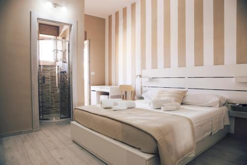 Llit o llits en una habitació de B&B NACALUI Gallipoli