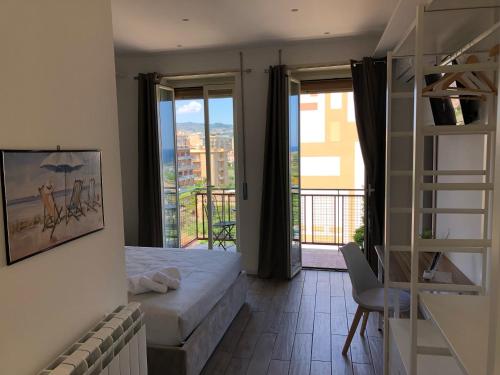 Ένα ή περισσότερα κρεβάτια σε δωμάτιο στο Seascape Rooms