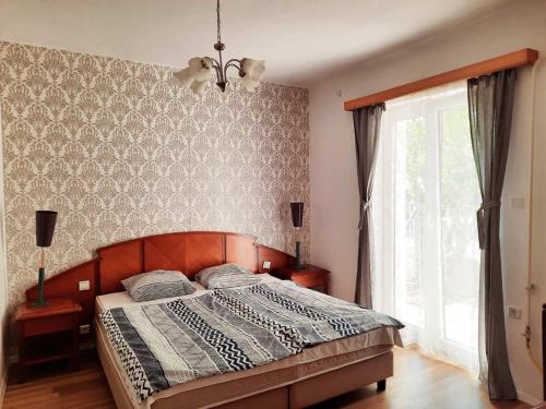 Posteľ alebo postele v izbe v ubytovaní Central Room
