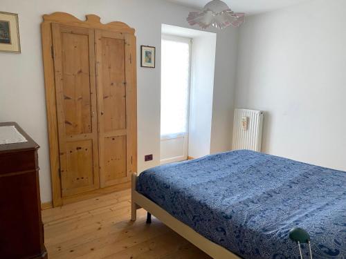 A bed or beds in a room at Laghetto delle Buse Home