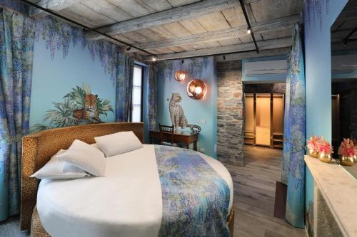 Кровать или кровати в номере Suites&Atelier Lake Como