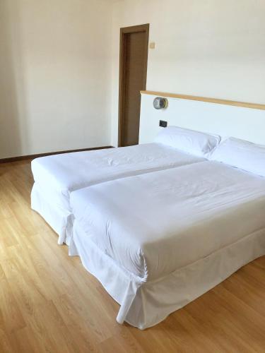 Hotel As Hortensiasにあるベッド