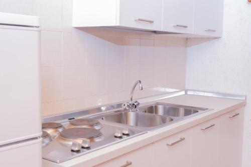 Kuchyňa alebo kuchynka v ubytovaní Casa vacanze La Maddalena