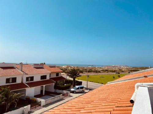 a view of the ocean from the roof of a house at Ocean view - Baleal beach house - Surf & Relax in Baleal
