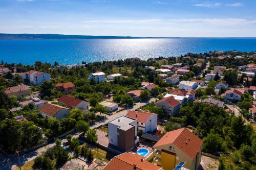 an aerial view of a small town next to the water at Lucija in Starigrad-Paklenica