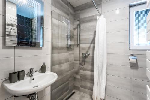 Koupelna v ubytování Family Apartments Klínovec
