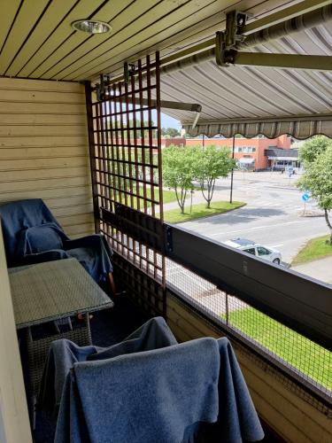 a room with a window with chairs and a table at Sun in Närpiö