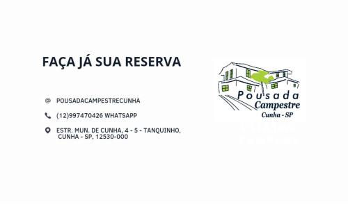 ein Label für eine Immobilienagentur mit einem Haus in der Unterkunft Pousada Campestre Cunha-SP in Cunha