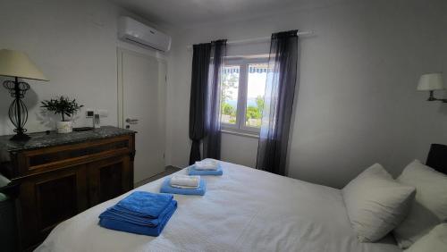 Posteľ alebo postele v izbe v ubytovaní Apartments Amadea