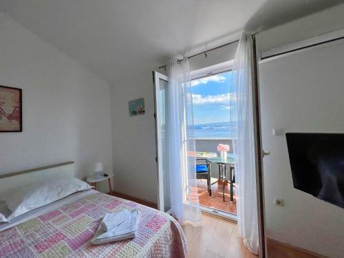 Postel nebo postele na pokoji v ubytování Apartments Rudi