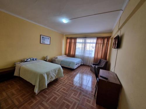 Postel nebo postele na pokoji v ubytování HOTEL ASTORE Matta 2537