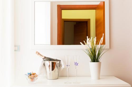 a bathroom counter with a mirror and a sink at Villa Paradise (Amalfi Coast - Luxury Home - Beach) in Vietri sul Mare