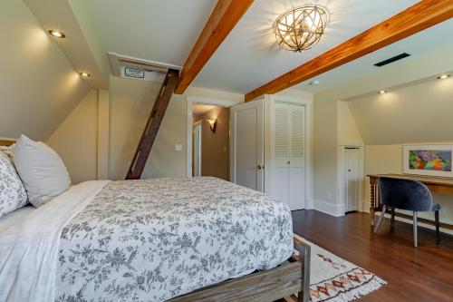 a bedroom with a bed and a table and a chair at Trinidad Pearl in Trinidad