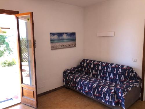 Katil atau katil-katil dalam bilik di Case dei limoni sul mare
