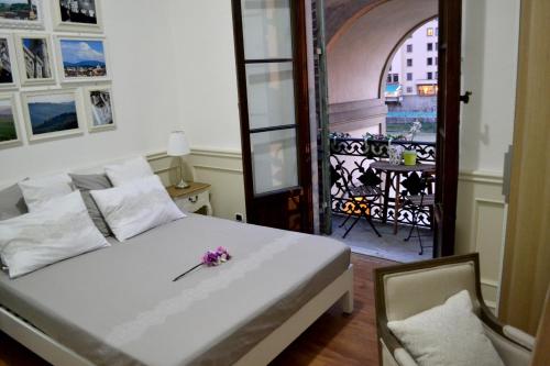 Rúm í herbergi á Pontevecchio Relais