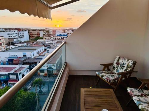 a balcony with a view of a city at OceanParc - Vue sur Mer et Parc 24H Sécurité in Mohammedia
