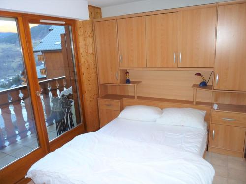 Postel nebo postele na pokoji v ubytování Appartement 3 pièces près des pistes avec balcon - Saint-Jean-d'Aulps - FR-1-573-105