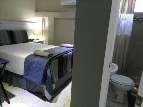 Postel nebo postele na pokoji v ubytování Hotel Vista del Mar