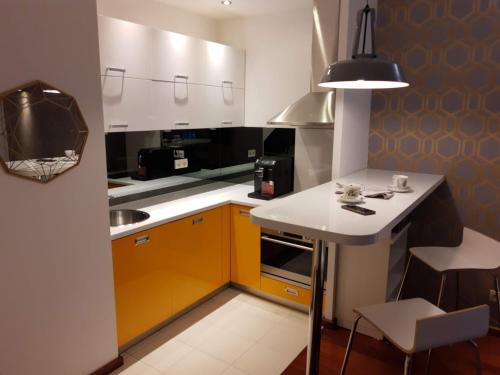 Kuchyňa alebo kuchynka v ubytovaní JM Apartment Old Town Krakow