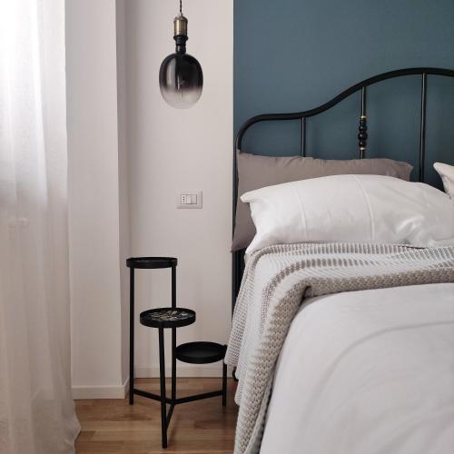 Ένα ή περισσότερα κρεβάτια σε δωμάτιο στο Casa Tulù B&B