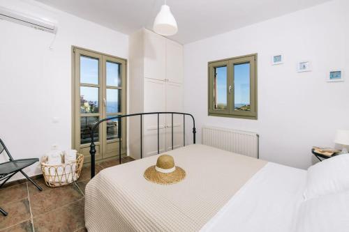 Postel nebo postele na pokoji v ubytování Family Fun in the Infinite Aegean by Neuvel