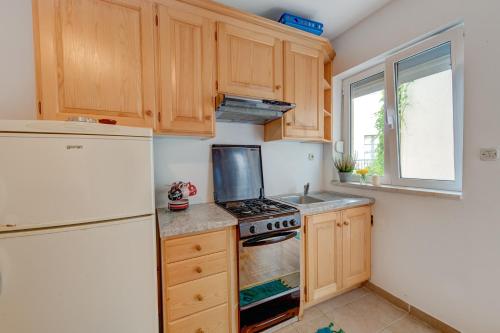Kuchyň nebo kuchyňský kout v ubytování Savaro apartments