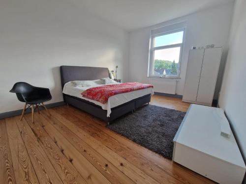 Postel nebo postele na pokoji v ubytování Stylisches Apartment in Hohenlimburg