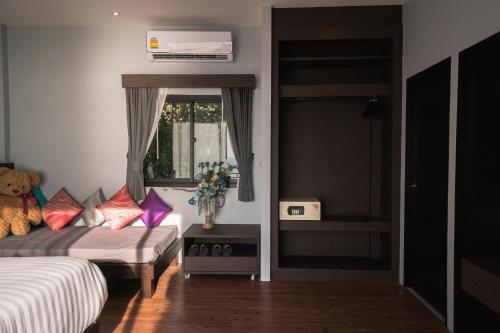 Postel nebo postele na pokoji v ubytování Sea Garden Resort Haad Chao Phao