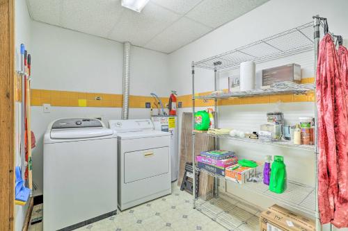 a laundry room with a washing machine in a room at Boone Hideaway with Deck, Grill and Forest Views! in Boone