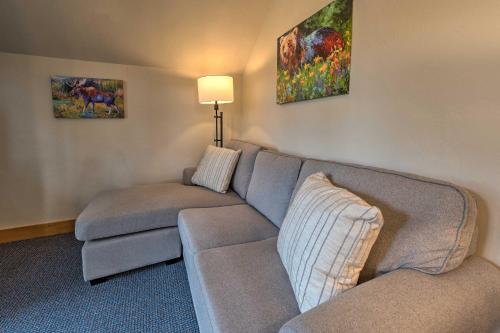 a living room with a couch and a lamp at Private McCall Apartment with Mountain View! in Donnelly