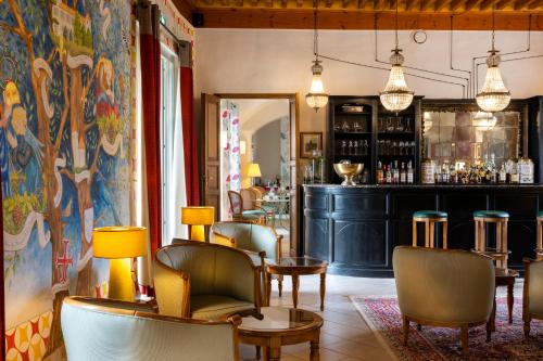 Lounge nebo bar v ubytování Château De Siran - Hôtel & Spa