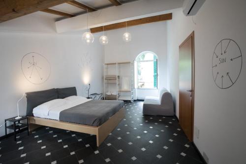 Una cama o camas en una habitación de Boutique Hotel Novecento