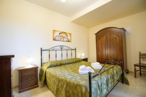 Posteľ alebo postele v izbe v ubytovaní Etna-Royal-View-Camera-Superior