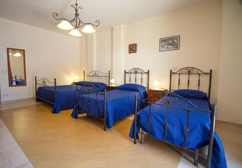 Posteľ alebo postele v izbe v ubytovaní Etna-Royal-View-Camera-Standard