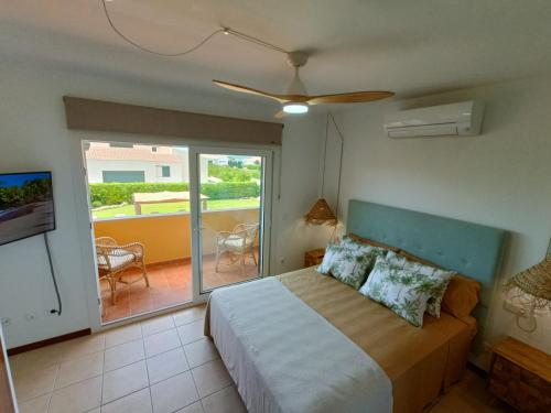 Posteľ alebo postele v izbe v ubytovaní VILLA VEGA RELAX EN EL PARAISO