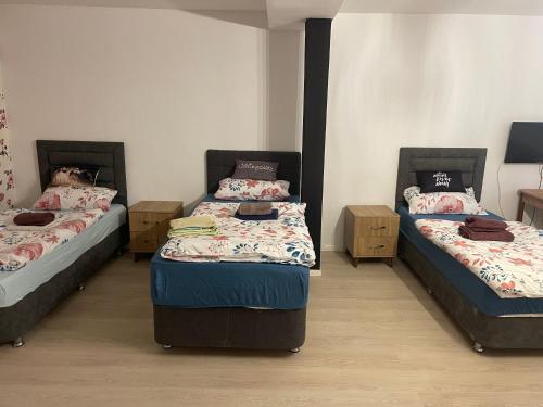 Ένα ή περισσότερα κρεβάτια σε δωμάτιο στο AGT Zimmervermietung