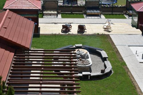 Zahrada ubytování Apartments and Rooms kod Eli