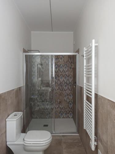 a bathroom with a shower with a toilet and a shower at Colleoni 19 in Civitanova Marche