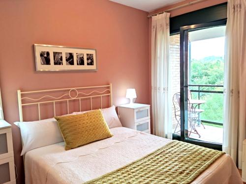 Кровать или кровати в номере Costa de Llanes
